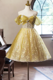 Yellow lace dress on a mannequin in a room with a piano and window.