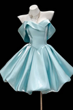 Light blue dress on a mannequin against a black background