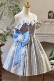 Mannequin wearing a decorative dress with a blue bow and pearl necklace against a blurred indoor background.