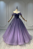 Purple evening gown on a mannequin against a gray wall.