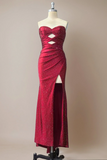 Red evening gown on a mannequin against a beige background