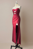 Red evening gown on a mannequin against a beige background