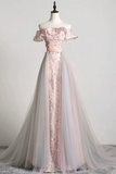 Pink off-shoulder evening gown on a mannequin against a plain background