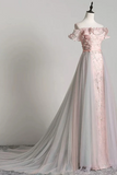 Pink off-shoulder evening gown on a mannequin against a plain background