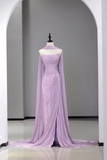 Lavender evening gown on a mannequin against a gray background