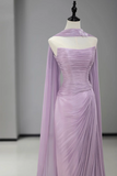 Lavender evening gown on a mannequin against a gray background