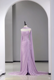 Lavender evening gown on a mannequin against a gray wall.