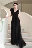Sophisticated Black Tulle Evening Gown with Asymmetrical Ruffle Detail

