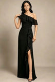 Woman wearing a black one-shoulder dress with ruffle details on a beige background