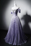 Purple evening gown on a mannequin against a dark background